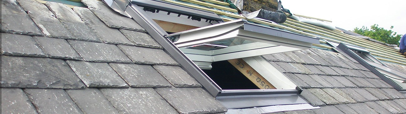 Roof windows in a slate roof